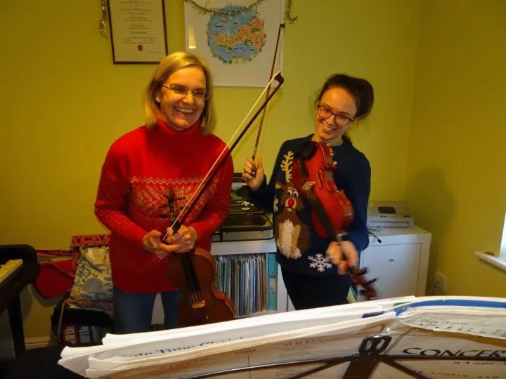 Rachel and Katy enjoying Violin Lessons